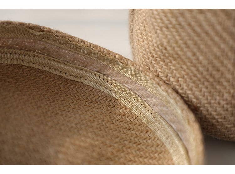 Detailed sewing of a linen and jute store basket