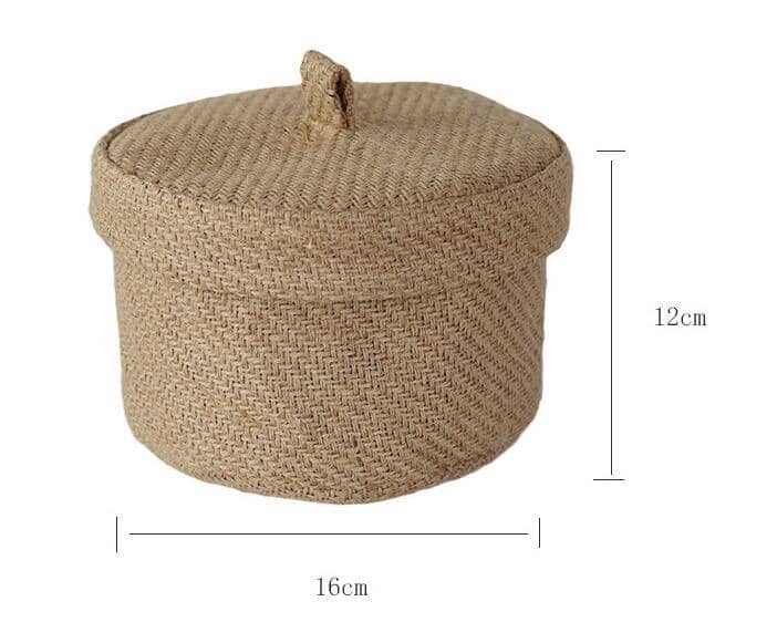 a light brown storage basket with detailed measures on a white canvas