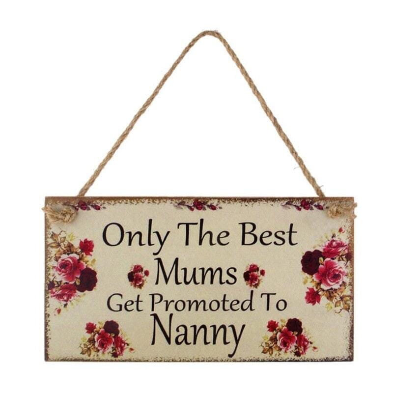 A wooden pendant plaque for home entrance decoration with message best mums and nanny's 