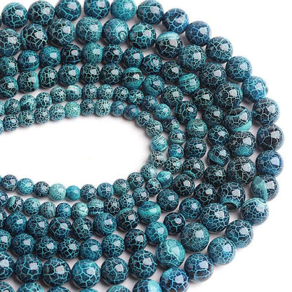 exposition of different sizes of natural agate round beads