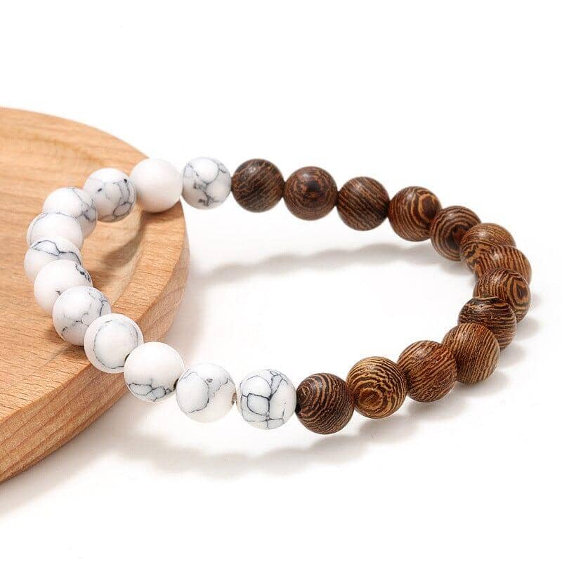 Brown and white  wood bead bracelet on a white canvas