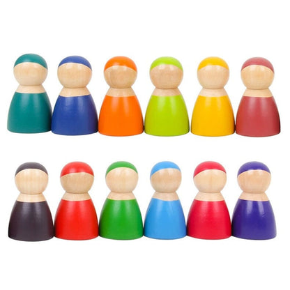 Eco-gift of rainbow puppets of different colors on aa white canvas
