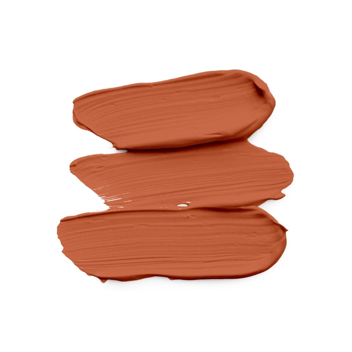 vegan burnt orange face eye corrector swatch on a white canvas