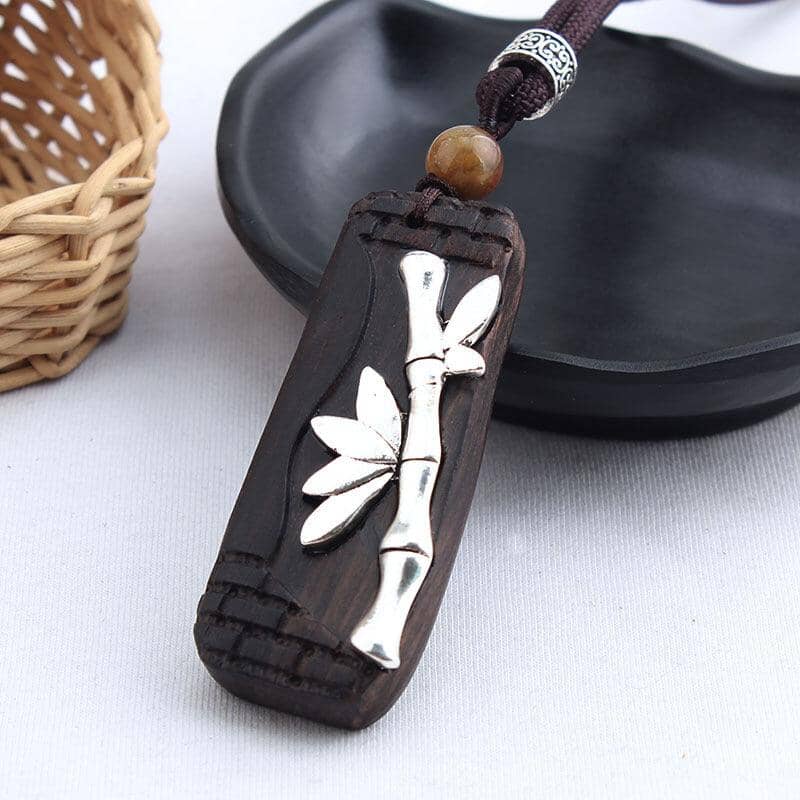 women long cotton and linen ebony wood pendant with a bamboo branch in silver